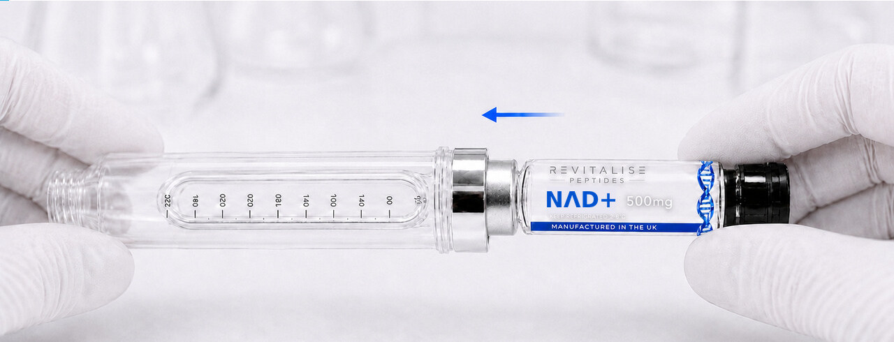 The transparent NΛD+ cartridge being inserted into the clear carrier silver end first