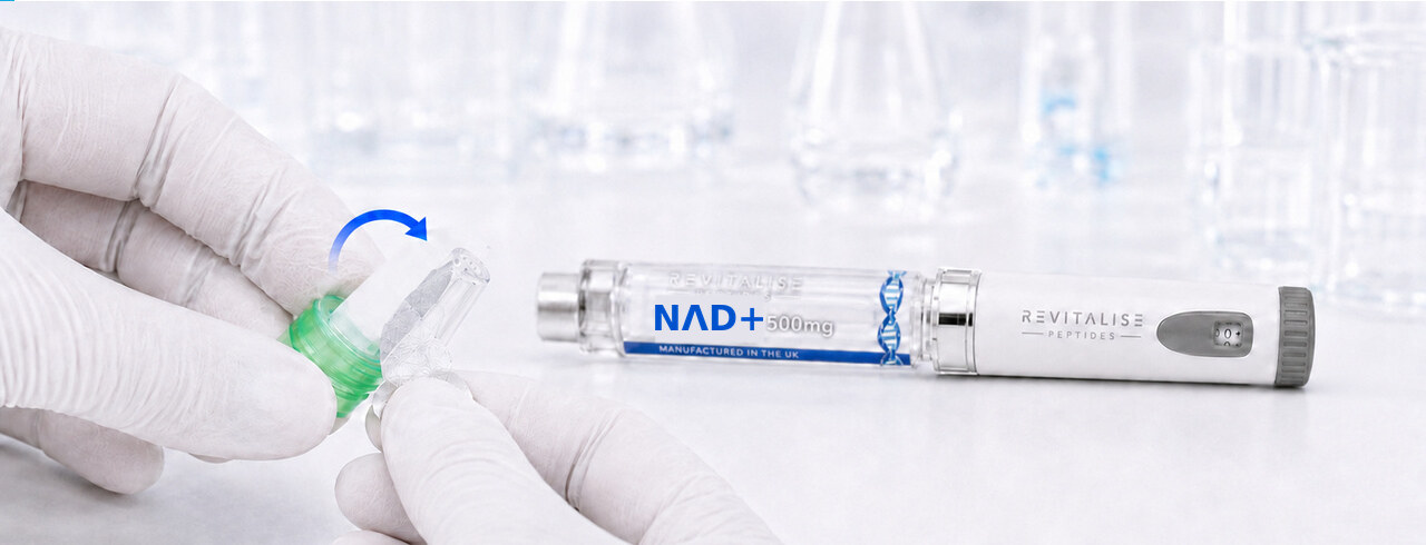 A gloved hand peeling the seal from a new green 32G needle