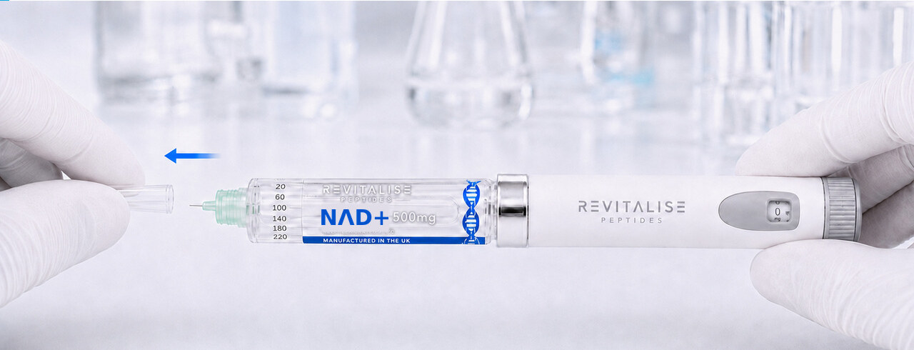 The short translucent inner cap being removed to expose the fine needle