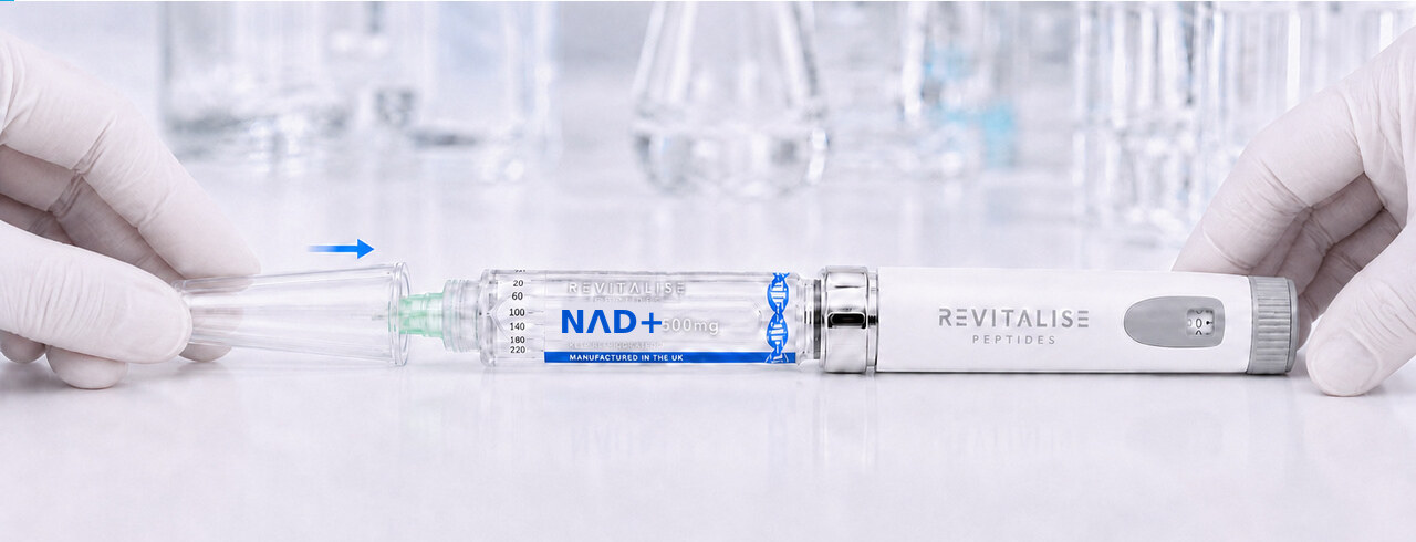 The large clear tapered cap being guided over the needle